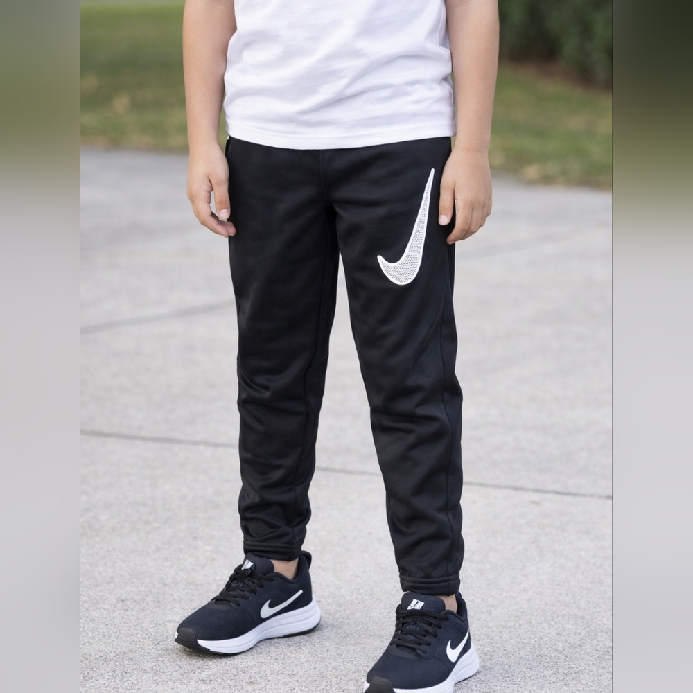 #1667 Nike Kids Drifit Black Joggers with White Speckled Swoosh Sz. M